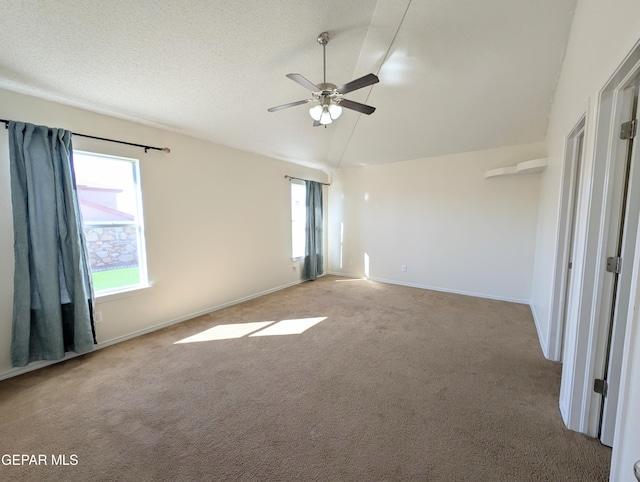11740 Autumn Wheat Dr, El Paso, TX 79934 - carpeted spare room featuring ceiling fan, baseboards, and lofted ceiling