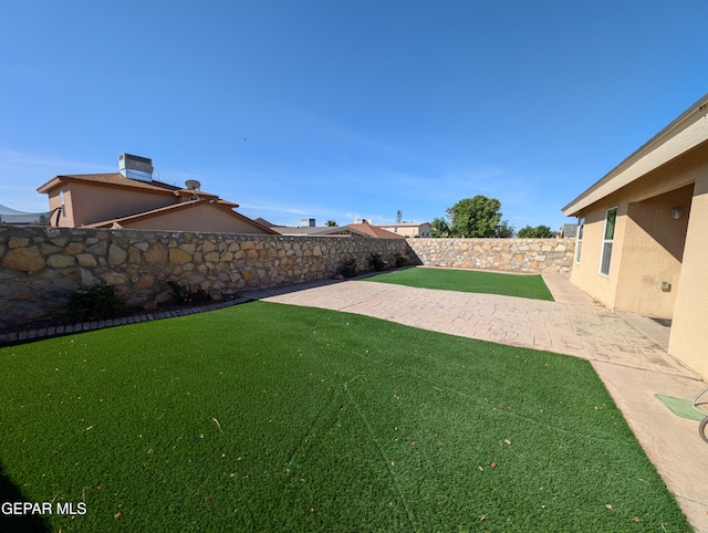 11740 Autumn Wheat Dr, El Paso, TX 79934 - view of yard featuring a patio