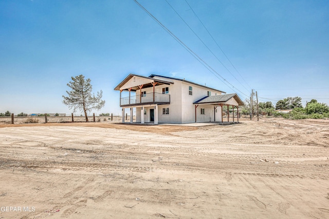 13090 Socorro Rd, San Elizario, TX 79849 - back of house featuring a balcony