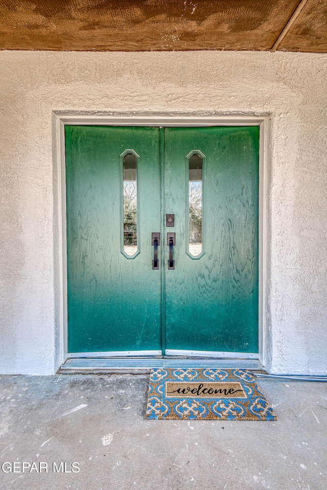 13090 Socorro Rd, San Elizario, TX 79849 - entrance to property featuring stucco siding