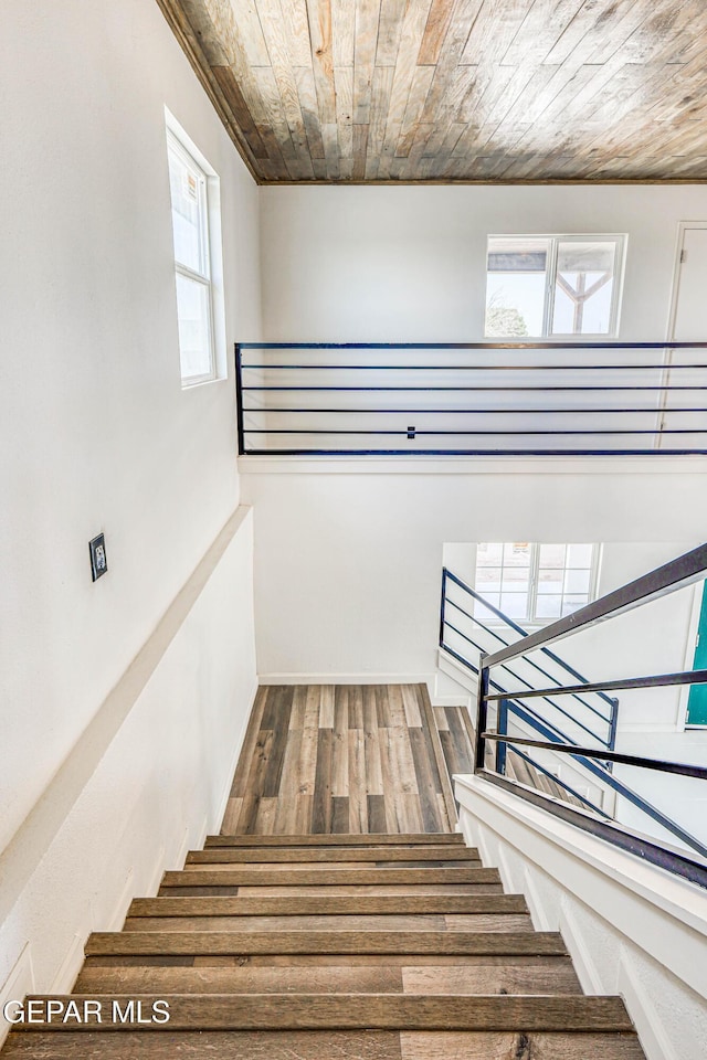 13090 Socorro Rd, San Elizario, TX 79849 - staircase with wooden ceiling, wood finished floors, and ornamental molding