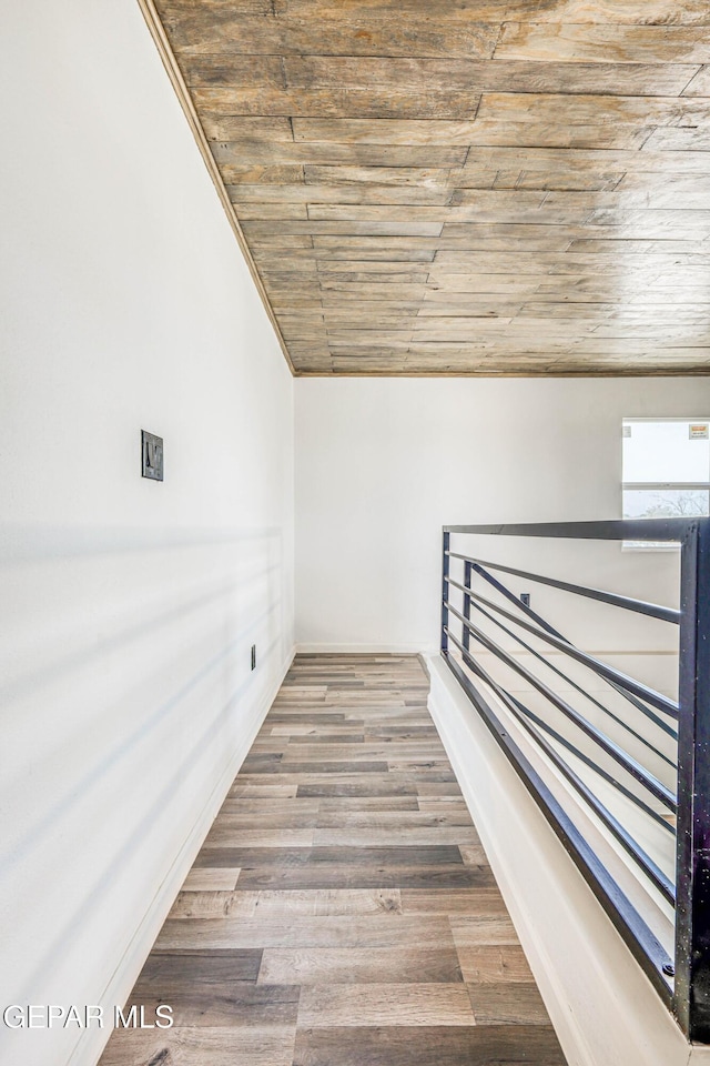 13090 Socorro Rd, San Elizario, TX 79849 - stairway with wooden ceiling, wood finished floors, and vaulted ceiling