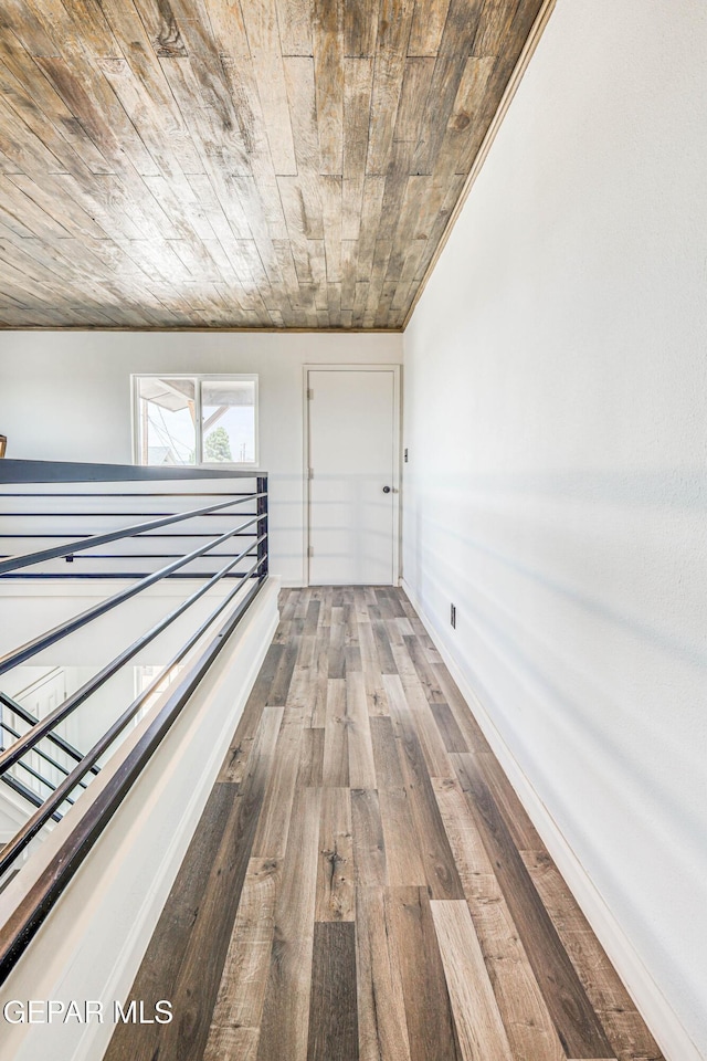 13090 Socorro Rd, San Elizario, TX 79849 - hall with wood ceiling and hardwood / wood-style floors