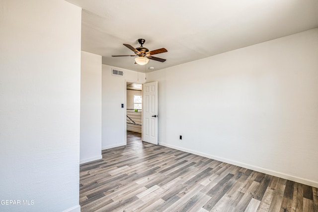 13090 Socorro Rd, San Elizario, TX 79849 - unfurnished room featuring ceiling fan, wood finished floors, and baseboards
