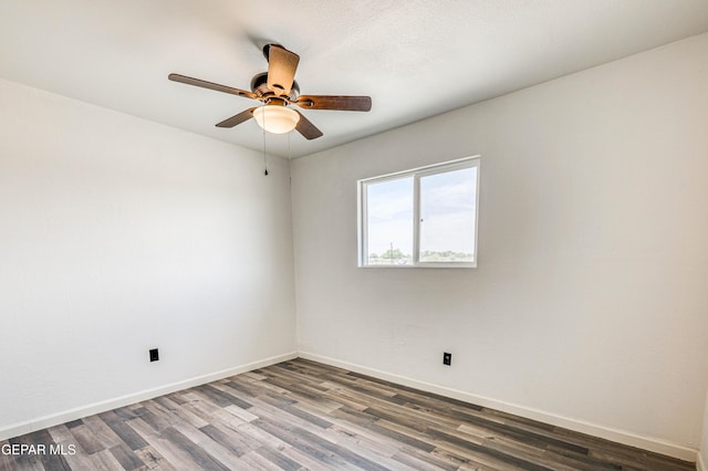 13090 Socorro Rd, San Elizario, TX 79849 - empty room with wood finished floors, a ceiling fan, and baseboards