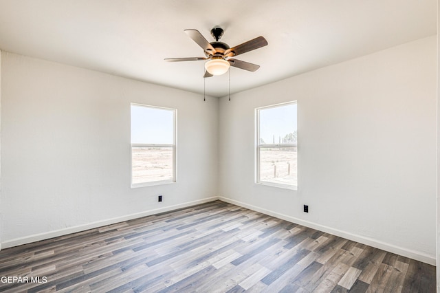 13090 Socorro Rd, San Elizario, TX 79849 - empty room featuring wood finished floors, baseboards, and ceiling fan