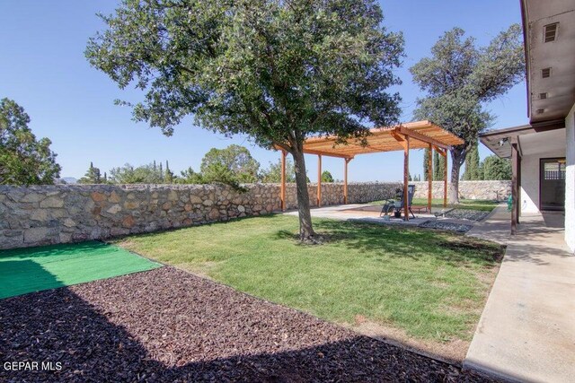 6504 Camino Fuente Dr, El Paso, TX 79912 - view of yard featuring a patio area and a pergola