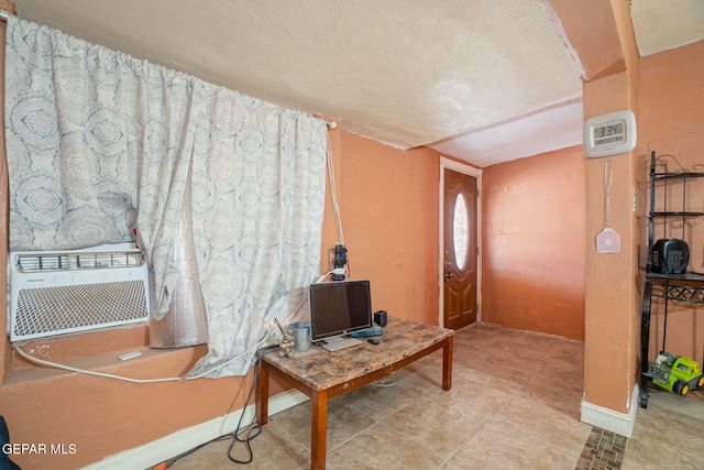 363 Ontiveros St, El Paso, TX 79932 - foyer entrance featuring a textured ceiling and baseboards