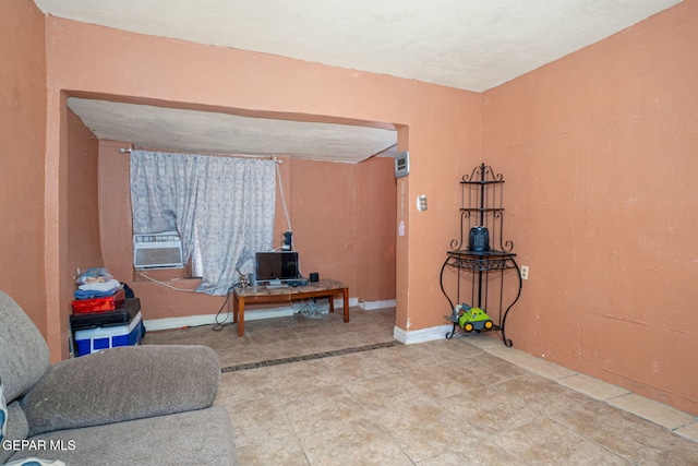 363 Ontiveros St, El Paso, TX 79932 - sitting room with tile patterned flooring, cooling unit, and baseboards