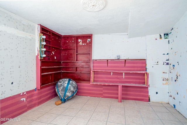 363 Ontiveros St, El Paso, TX 79932 - misc room with a textured ceiling