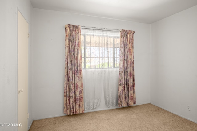 1611 N Kansas St, El Paso, TX 79902 - unfurnished room featuring carpet floors