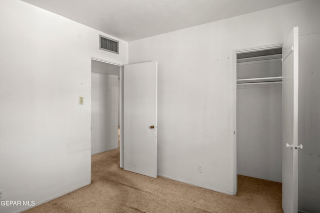 1611 N Kansas St, El Paso, TX 79902 - unfurnished bedroom featuring carpet floors and a closet
