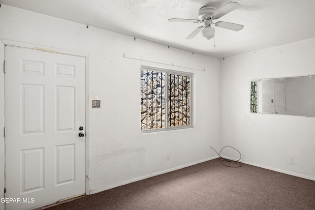 1611 N Kansas St, El Paso, TX 79902 - carpeted empty room with a ceiling fan and baseboards