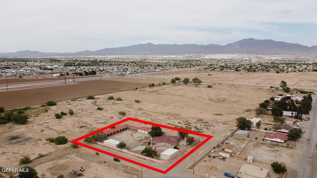 6100 Valley Dr, El Paso, TX 79932 - view of rural area featuring a mountainous background, property boundaries highlighted, and a desert landscape