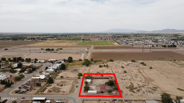 6100 Valley Dr, El Paso, TX 79932 - aerial overview of property's location featuring property boundaries highlighted and mountains