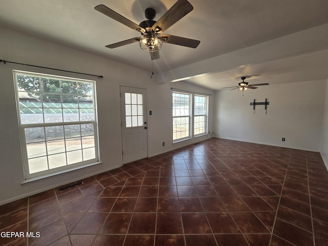 5121 Juliandra Ave, El Paso, TX 79924 - foyer with dark tile patterned floors, ceiling fan, and baseboards