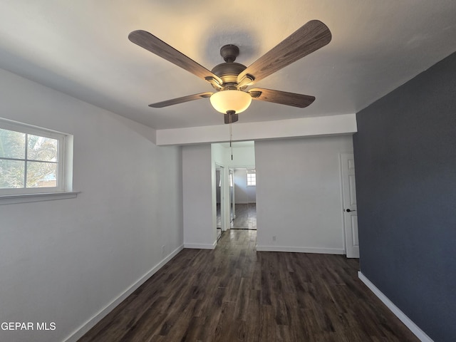 5121 Juliandra Ave, El Paso, TX 79924 - empty room with dark wood-type flooring, a ceiling fan, and baseboards