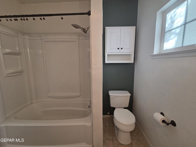 5121 Juliandra Ave, El Paso, TX 79924 - bathroom featuring baseboards, tile patterned flooring, toilet, and tub / shower combination