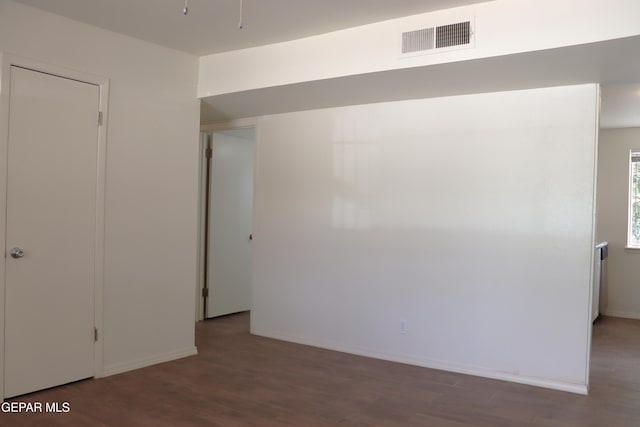 10544 Olga St, El Paso, TX 79924 - empty room featuring wood finished floors and baseboards