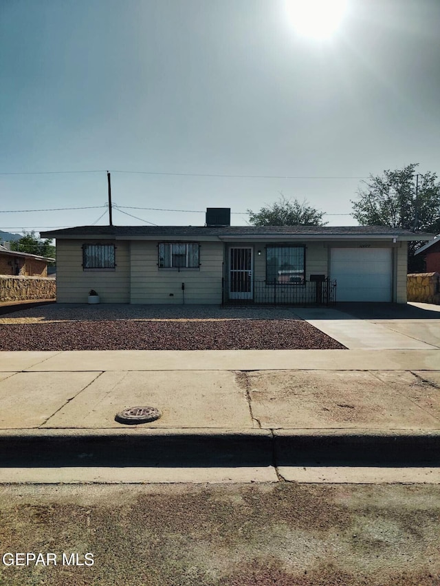 10077 Kirwood St, El Paso, TX 79924 - single story home with an attached garage and concrete driveway