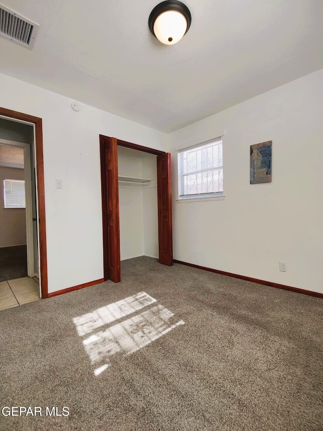 10077 Kirwood St, El Paso, TX 79924 - unfurnished bedroom with carpet, a closet, and baseboards