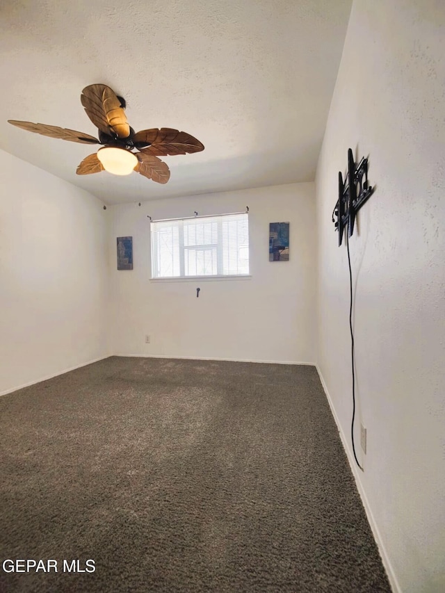 10077 Kirwood St, El Paso, TX 79924 - carpeted empty room with a ceiling fan