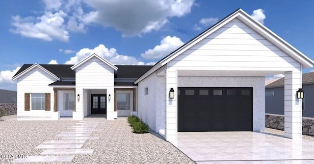 7363 Cimarron Rim Dr, El Paso, TX 79911 - view of front of property featuring french doors, driveway, and a garage