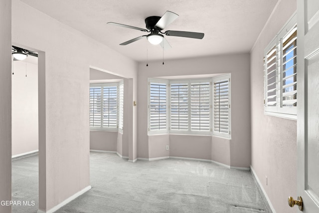 8213 Mineola Dr, El Paso, TX 79925 - spare room featuring ceiling fan and carpet