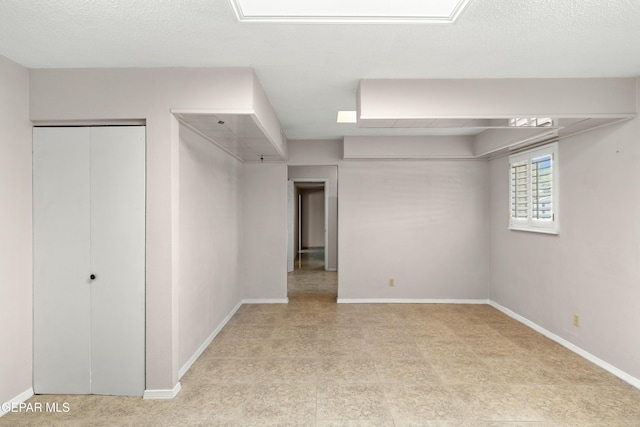 8213 Mineola Dr, El Paso, TX 79925 - unfurnished bedroom with baseboards and tile patterned floors