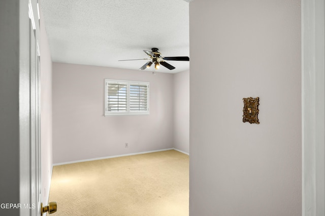 8213 Mineola Dr, El Paso, TX 79925 - carpeted spare room featuring ceiling fan, baseboards, and a textured ceiling
