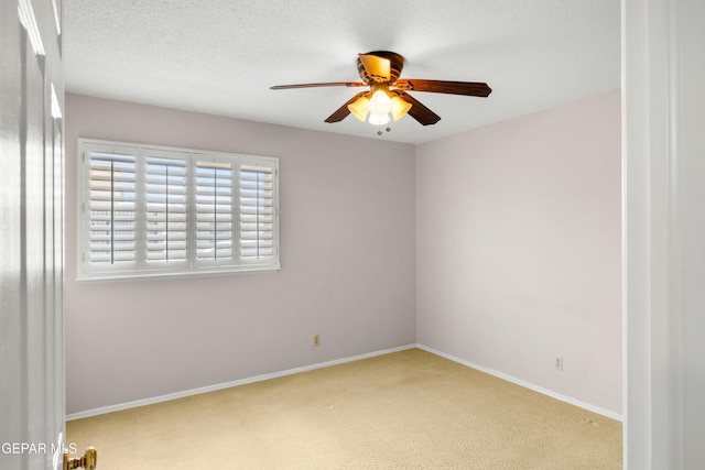 8213 Mineola Dr, El Paso, TX 79925 - empty room featuring ceiling fan, carpet floors, baseboards, and a textured ceiling