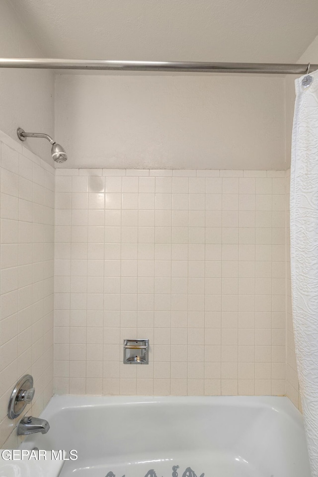 8213 Mineola Dr, El Paso, TX 79925 - full bathroom with shower / bath combination with curtain