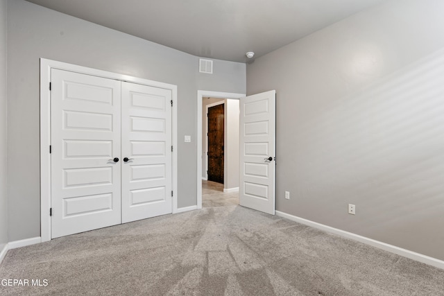 12287 Houghton Spgs, Horizon City, TX 79928 - unfurnished bedroom featuring carpet, baseboards, and a closet