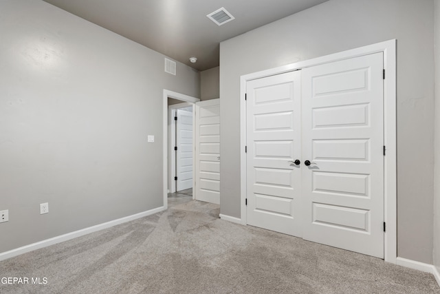 12287 Houghton Spgs, Horizon City, TX 79928 - unfurnished bedroom with carpet, baseboards, and a closet
