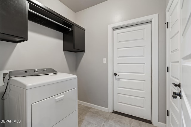 12287 Houghton Spgs, Horizon City, TX 79928 - laundry area featuring washer / clothes dryer, cabinet space, baseboards, and light tile patterned floors