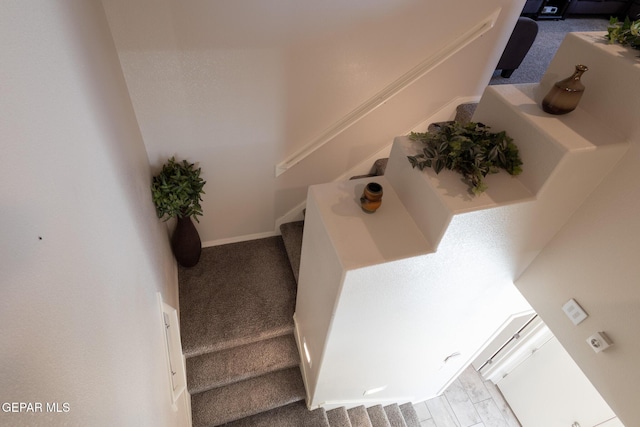 12301 Desert Heights Ct, El Paso, TX 79938 - stairway featuring carpet flooring