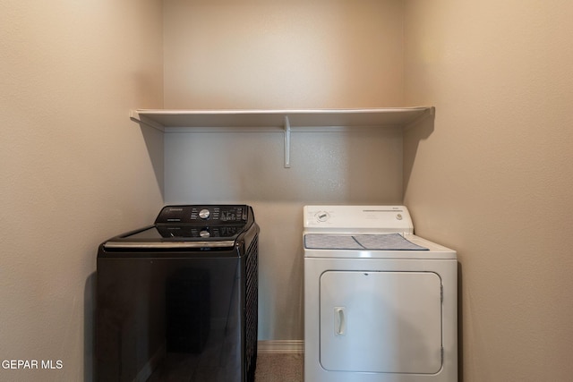 12301 Desert Heights Ct, El Paso, TX 79938 - laundry area with washing machine and clothes dryer