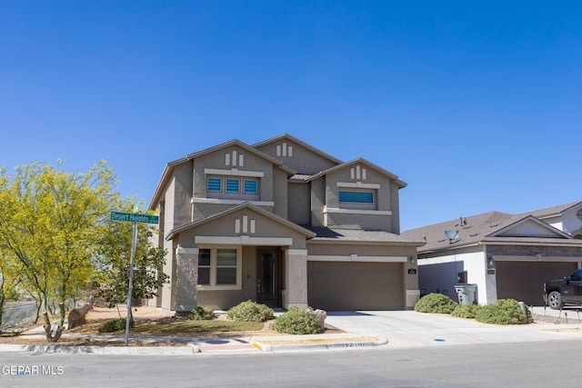12301 Desert Heights Ct, El Paso, TX 79938 - view of front of home with stucco siding, concrete driveway, and an attached garage