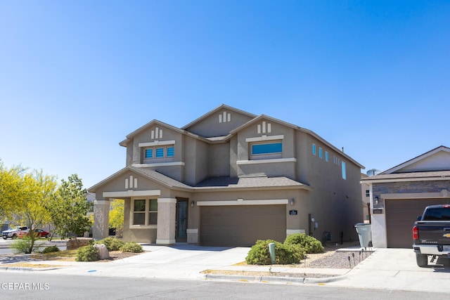 12301 Desert Heights Ct, El Paso, TX 79938 - view of front of home with stucco siding, concrete driveway, and an attached garage