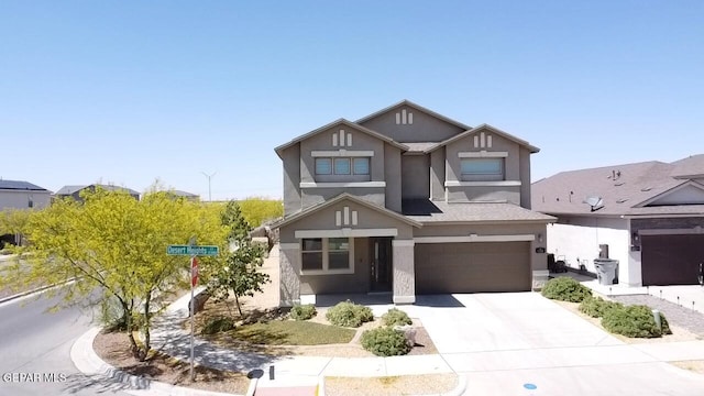 12301 Desert Heights Ct, El Paso, TX 79938 - view of front of property featuring stucco siding, an attached garage, and driveway
