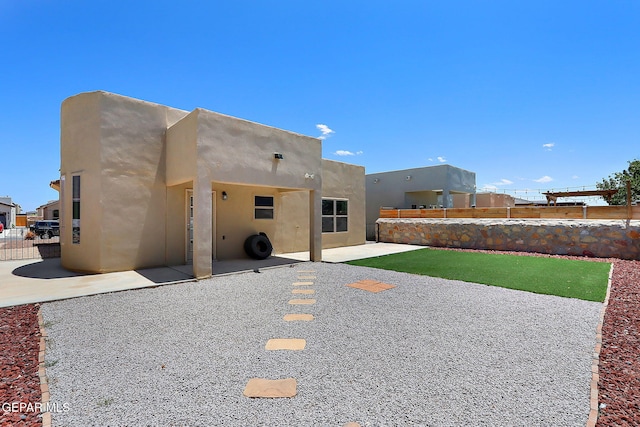 533 Cedarwood Ave, El Paso, TX 79928 - back of property with a patio and stucco siding