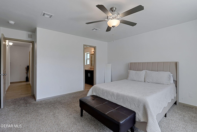 533 Cedarwood Ave, El Paso, TX 79928 - bedroom with carpet flooring, baseboards, a ceiling fan, and ensuite bath