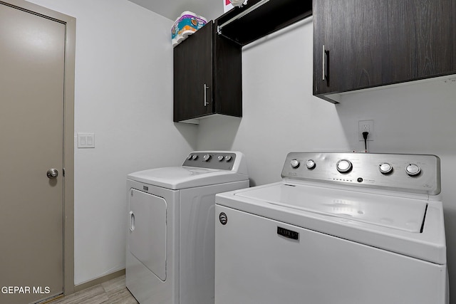 533 Cedarwood Ave, El Paso, TX 79928 - laundry room with washer and clothes dryer and cabinet space