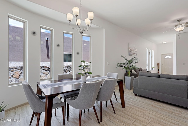 533 Cedarwood Ave, El Paso, TX 79928 - dining area featuring a chandelier, baseboards, and a ceiling fan