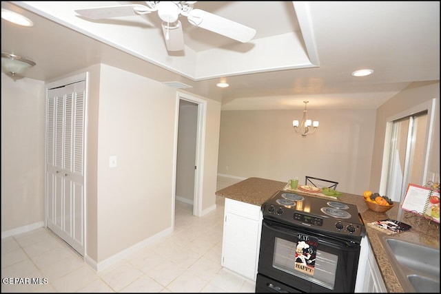 212 Paso Noble Dr, El Paso, TX 79912 - kitchen with electric range, a ceiling fan, dark countertops, recessed lighting, and white cabinets