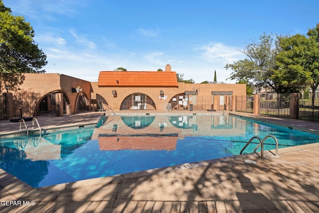 212 Paso Noble Dr, El Paso, TX 79912 - community pool with a patio