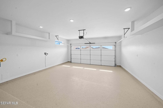 13399 Jeff Winton Dr, El Paso, TX 79928 - garage featuring recessed lighting and baseboards