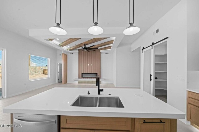 13399 Jeff Winton Dr, El Paso, TX 79928 - kitchen with a sink, open floor plan, dishwasher, light countertops, and a ceiling fan