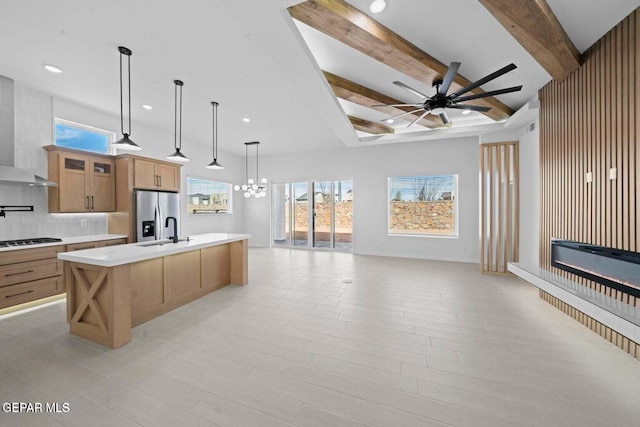 13399 Jeff Winton Dr, El Paso, TX 79928 - kitchen featuring open floor plan, stainless steel fridge with ice dispenser, a sink, a ceiling fan, and light countertops