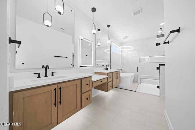 13399 Jeff Winton Dr, El Paso, TX 79928 - full bath featuring vanity, a soaking tub, and a shower stall